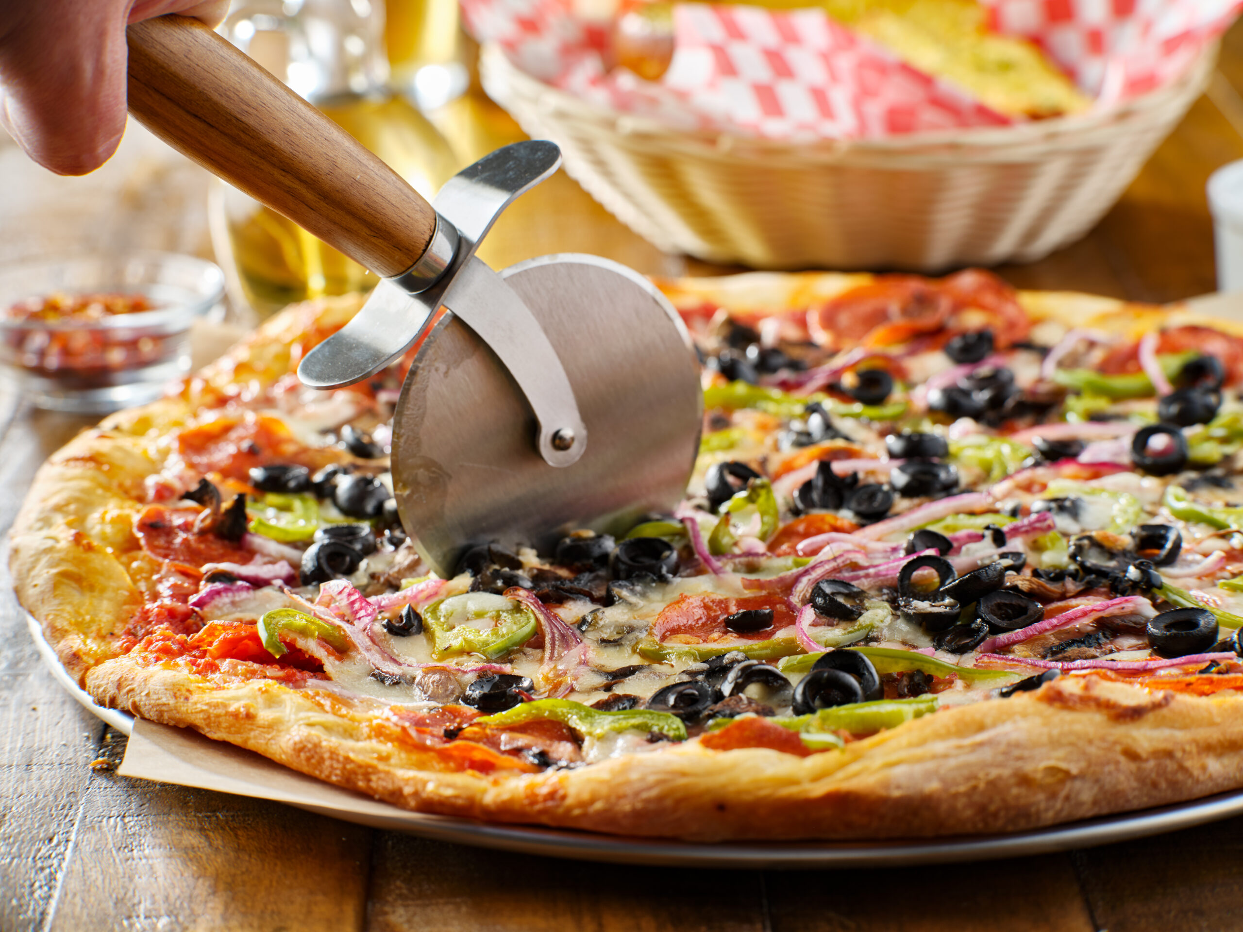 tasty supreme pizza with olives peppers onions and sausage pizza